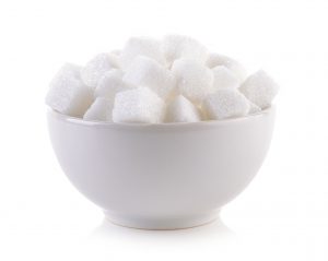 sugar cube in the bowl on white background