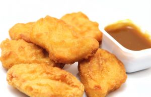 Image of Chicken Nuggets With Sauce on white